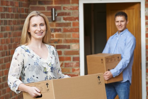A Kensington home relocation with packed boxes and moving equipment
