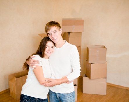Moving team protecting furniture during a Kensington van and man service