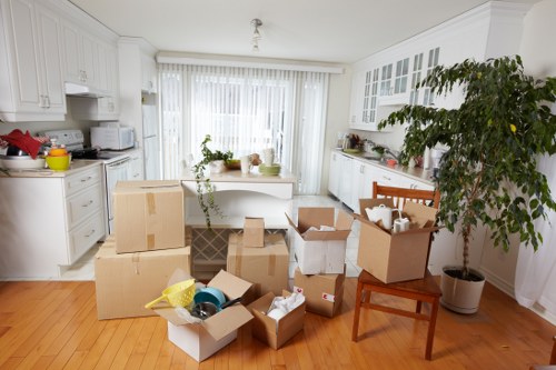 Staff using public liability and safety procedures during removals