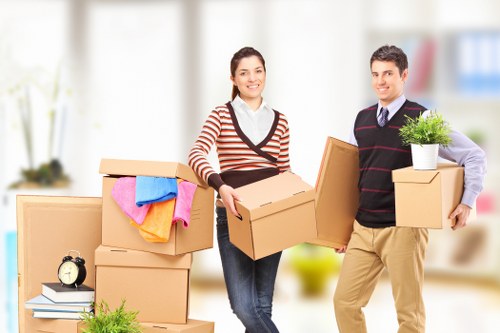 Loading furniture into a removal truck in Kensington