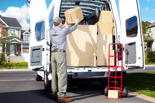 Sorted cardboard and recyclable materials prepared for transfer station processing