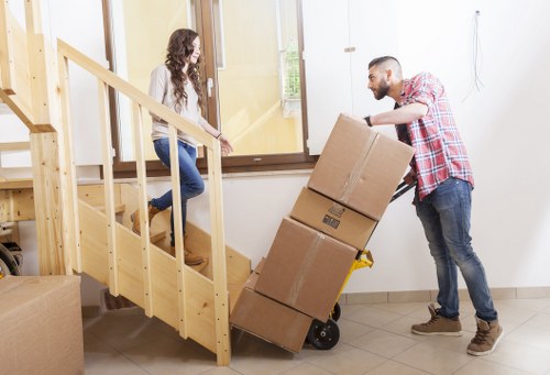 Commercial furniture removal team working in a Kensington business property