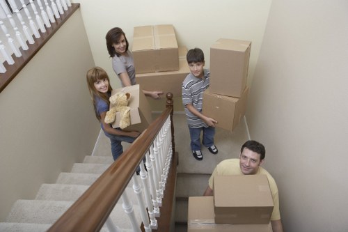 Prepared moving boxes and furniture ready for a Kensington home removal